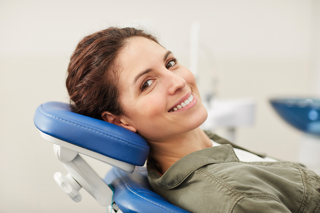 Woman having her health concerns answered by her dentist