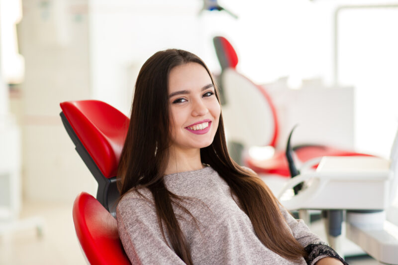 Happy girl in dentistry
